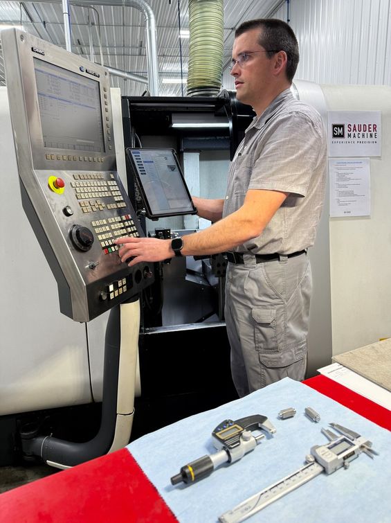 A Sauder Machine machinist at work